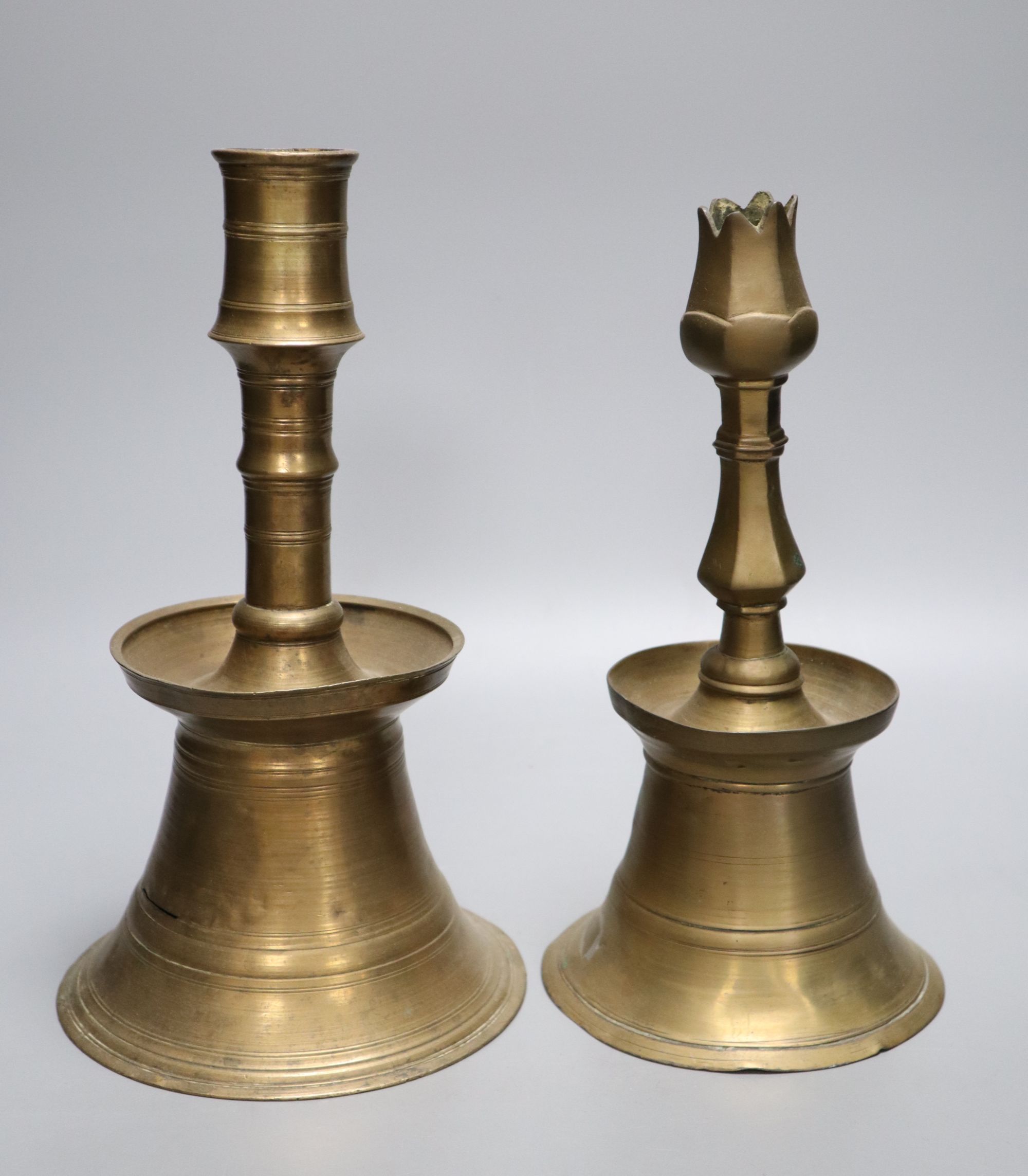 Two Ottoman brass candlesticks, height 28cm